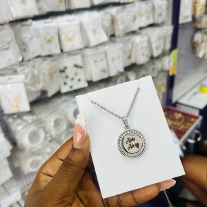 Stoned round engraved necklace