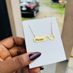 Engraved gold infinity necklace