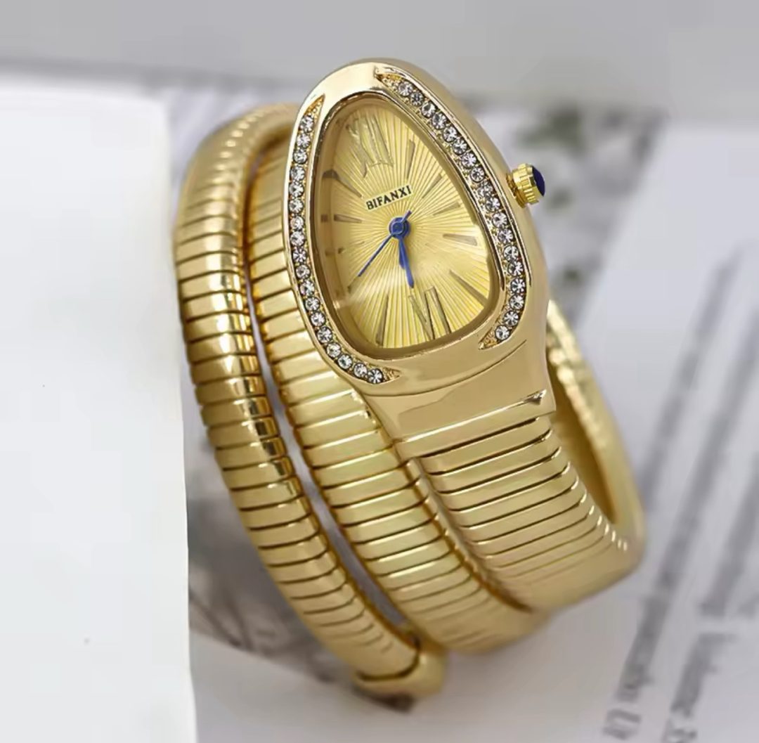 Luxury gold gold face bifanxi spiral female watch