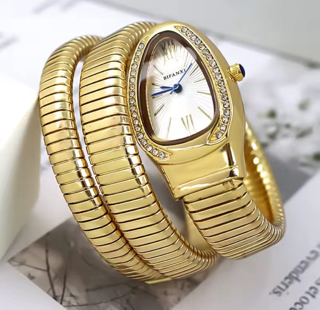 Luxury gold  white face bifanxi spiral female watch