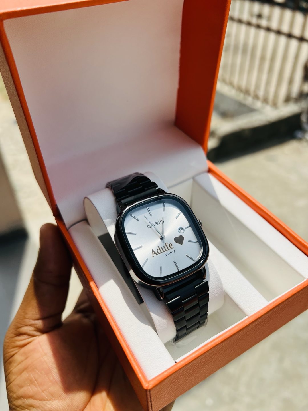 Black white face engraved casio watch