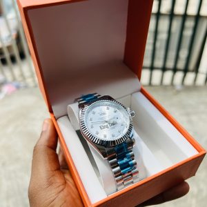 Silver male face engraved Rolex watch