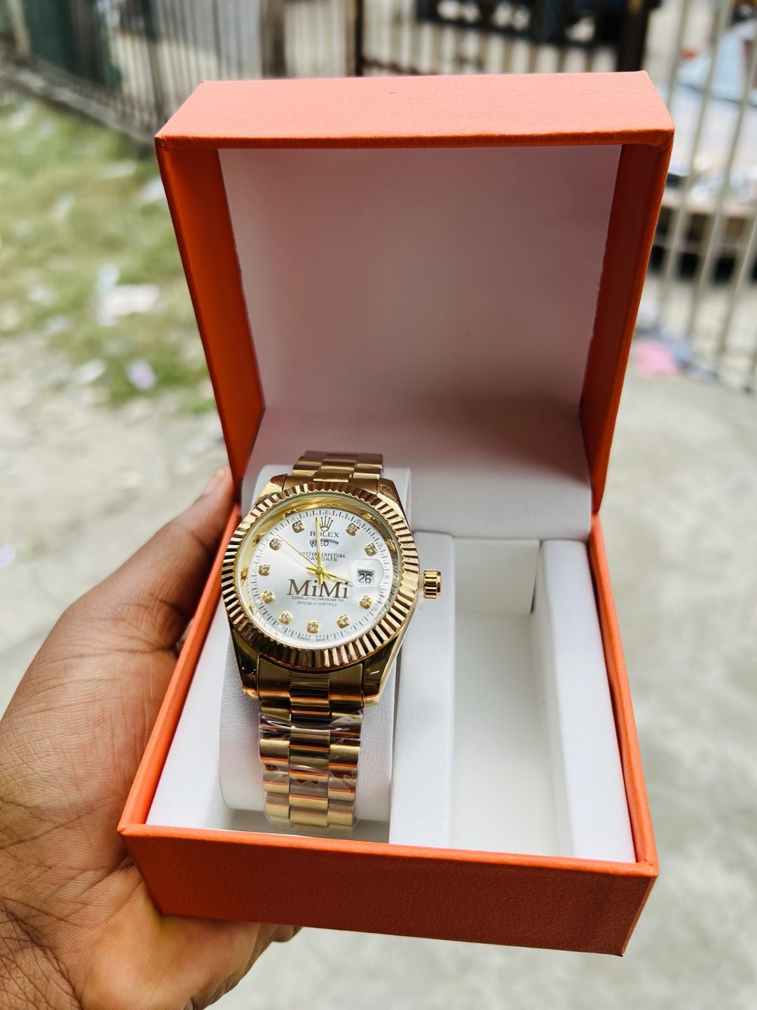 Gold Male Face engraved rolex watch