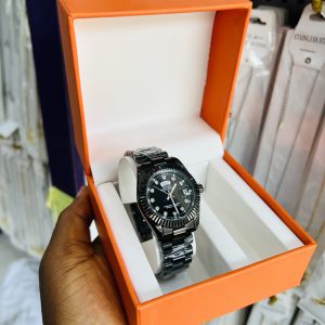 Engraved female black Rolex watch