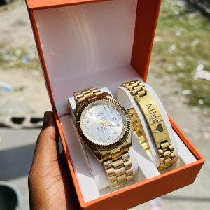 Gold engraved Rolex watch and bracelet