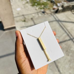 Gold draw string necklace