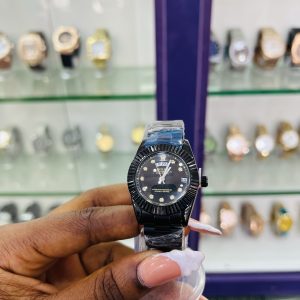 Black female Rolex watch
