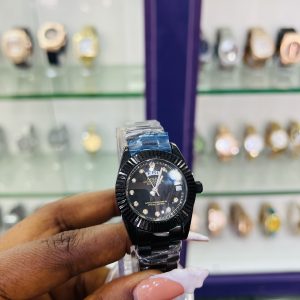 Black female Rolex watch