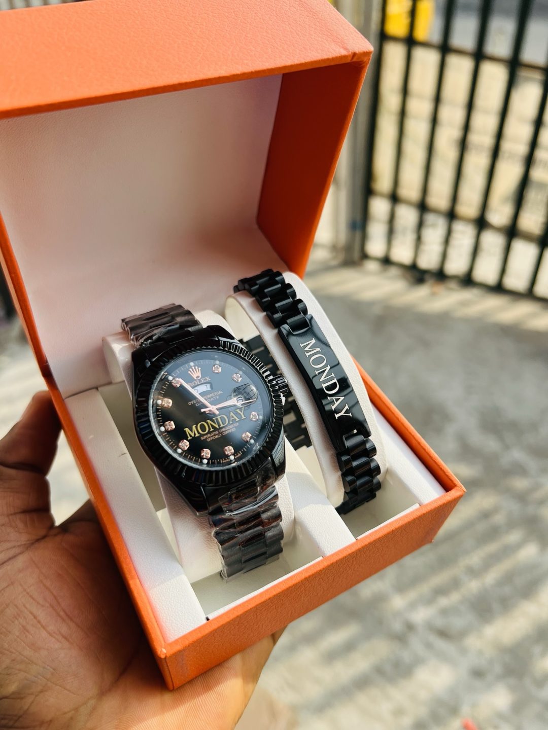 Black Engraved Rolex watch and bracelet