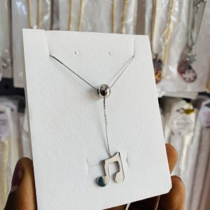 Lyrical ball necklace