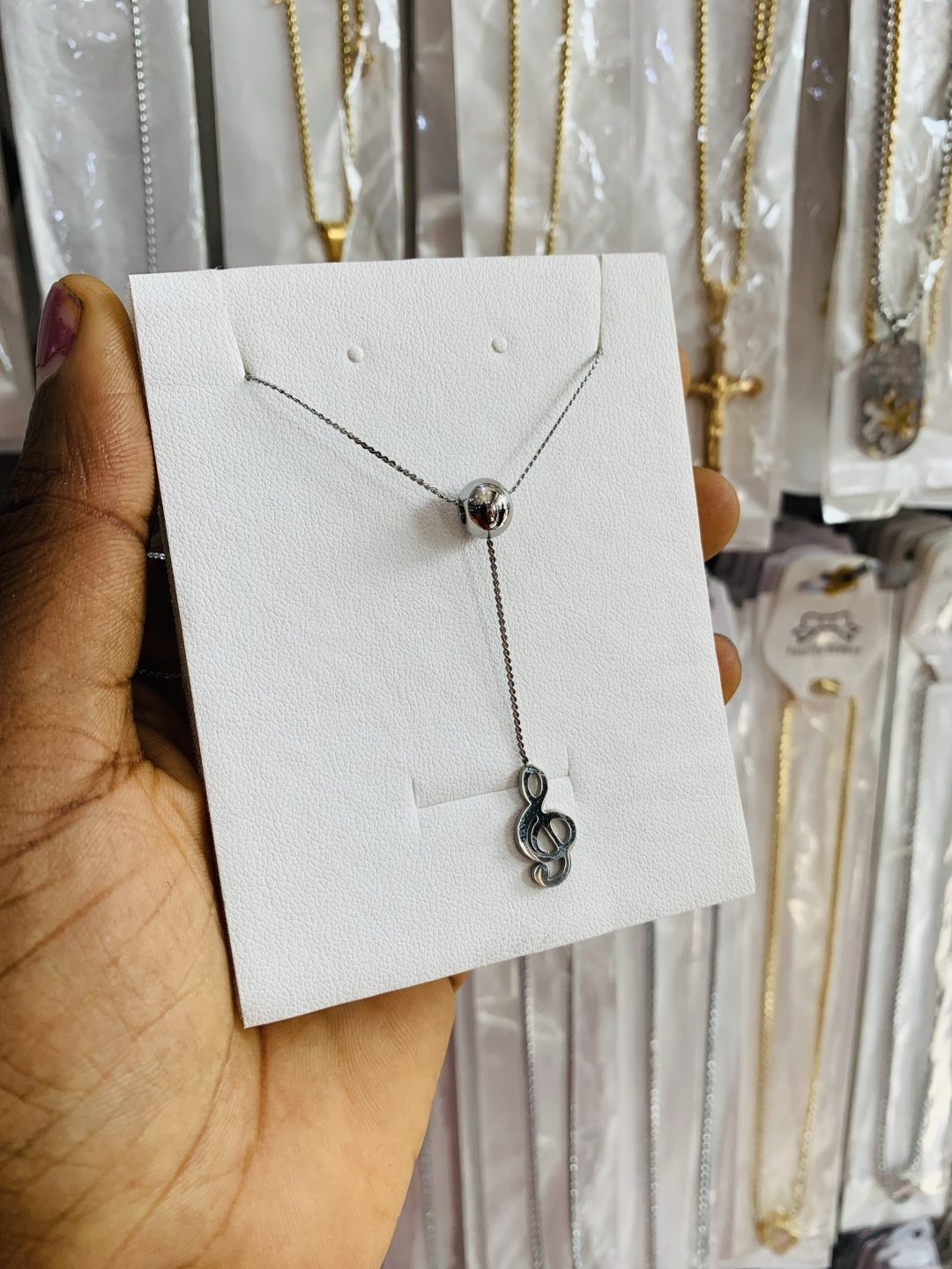 Clef ball necklace
