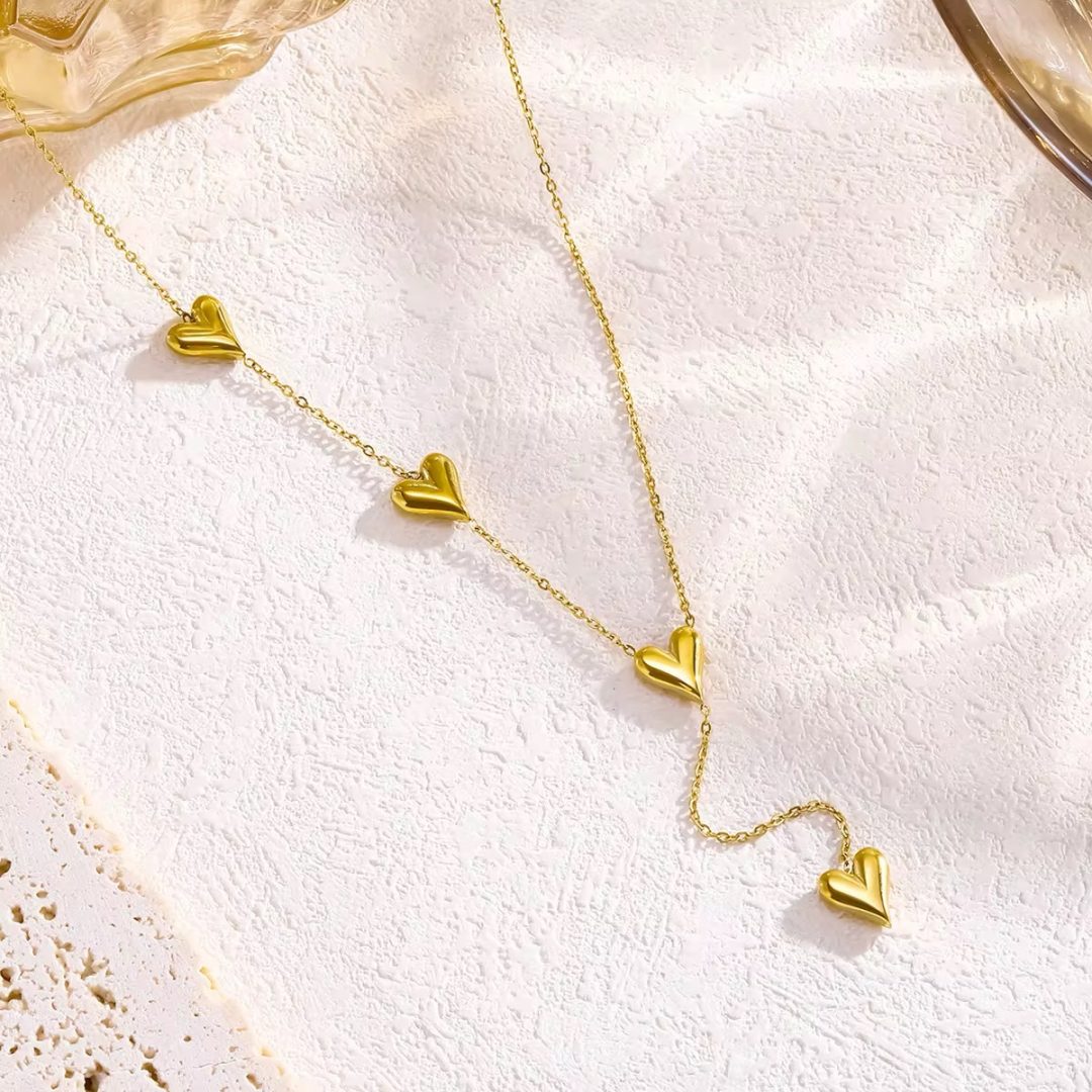 4 heart gold titanium necklace - Image 2