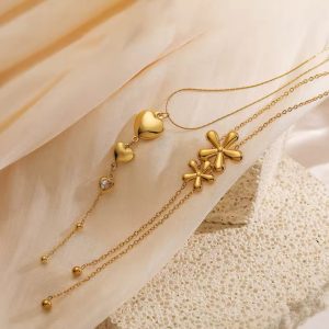 3 heart Göld titanium necklace