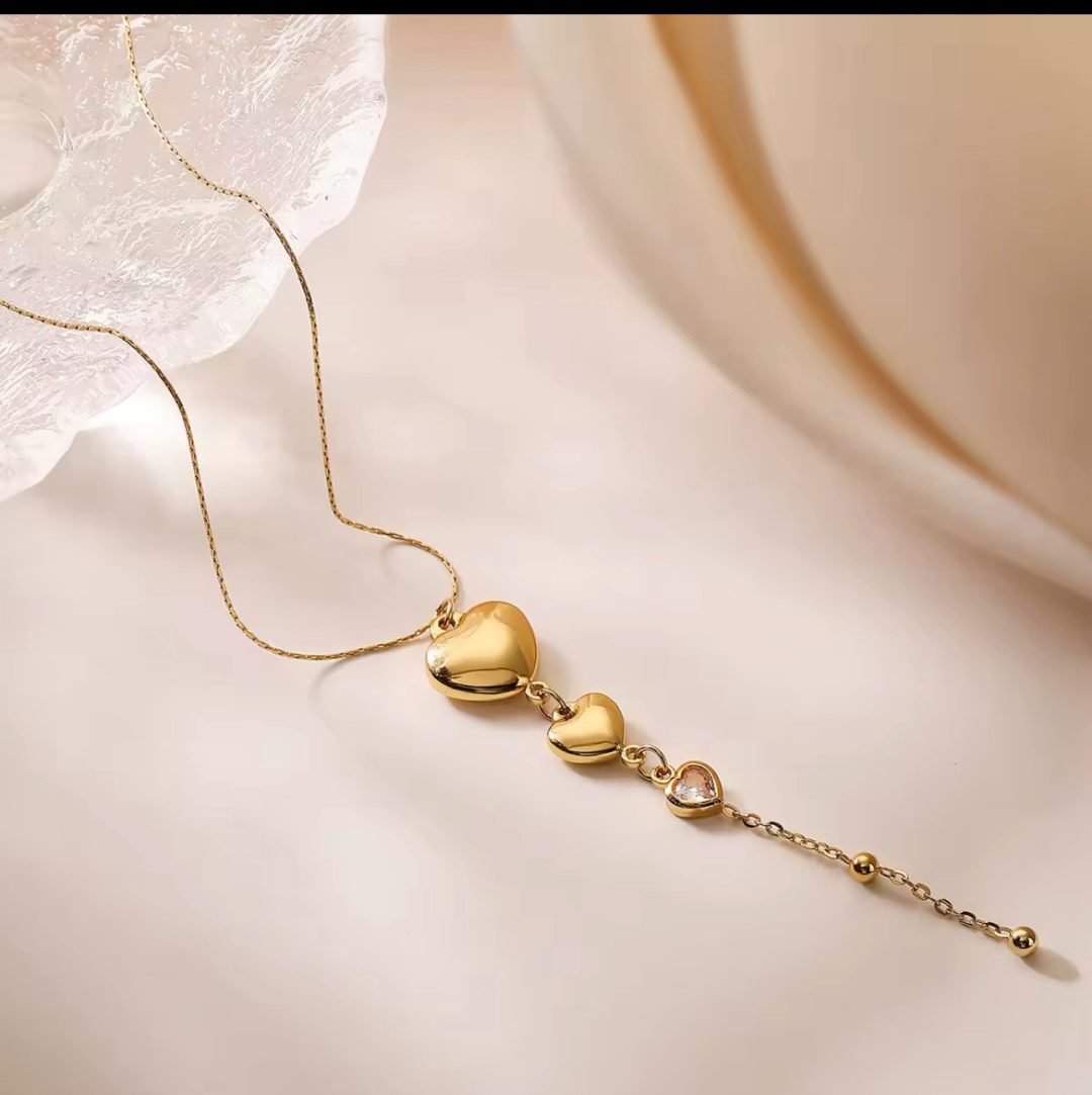 3 heart Göld titanium necklace