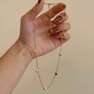 7 heart Göld titanium steel necklace