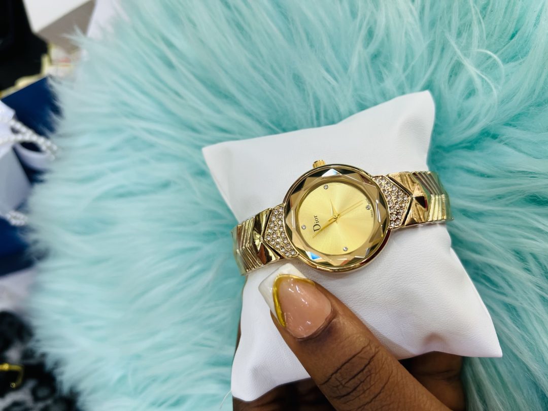Dior sleek female gold watch