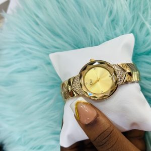 Dior sleek female gold watch