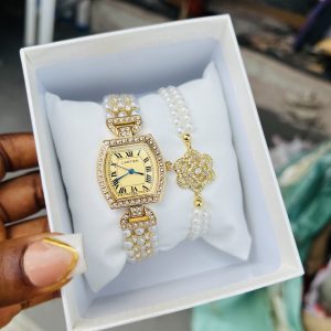Gold Cartier pearl watch combo with box
