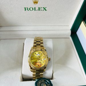 Original Female Rolex (D/T)  Gold gold face