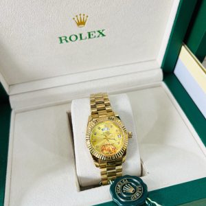 Original Female Rolex (D/T)  Gold gold face