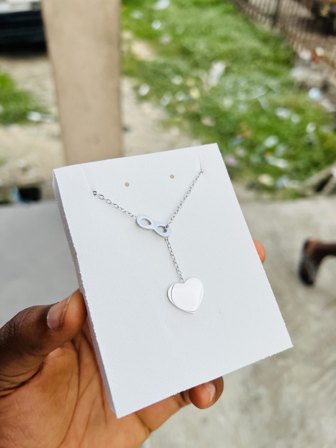 Engraved dropping silver love necklace