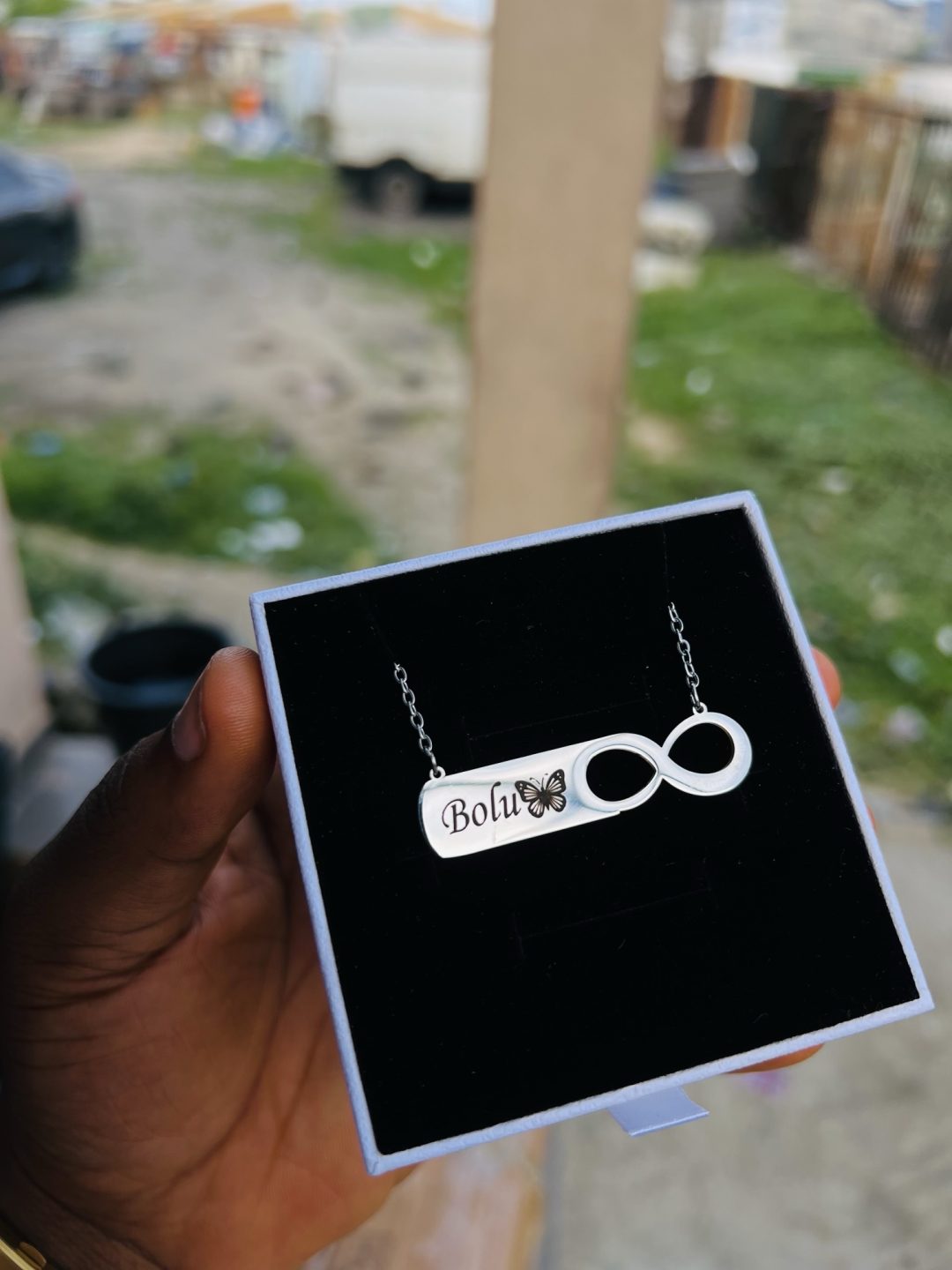 Engraved silver infinity necklace with emoji