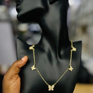Five butterfly round gold necklace