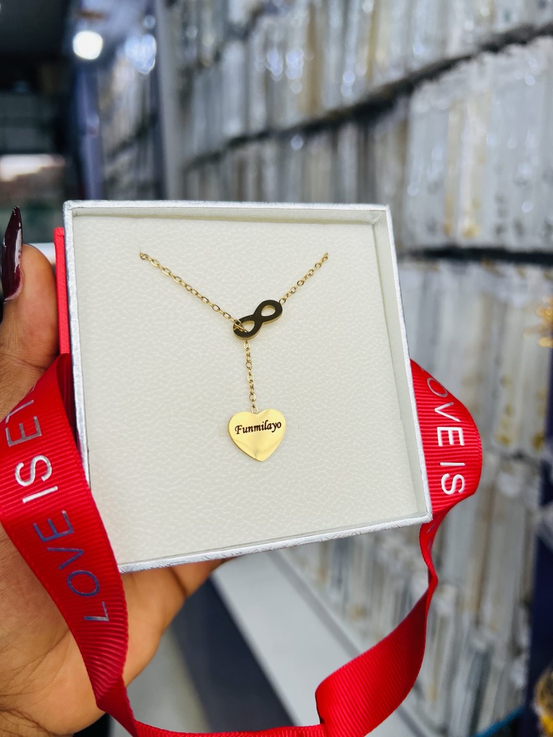 Engraved dropping gold love necklace