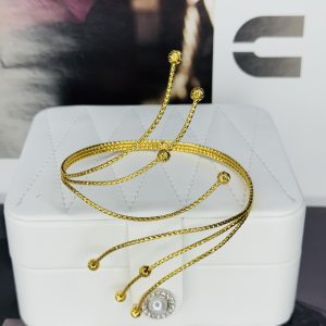 Three line arm cuff gold