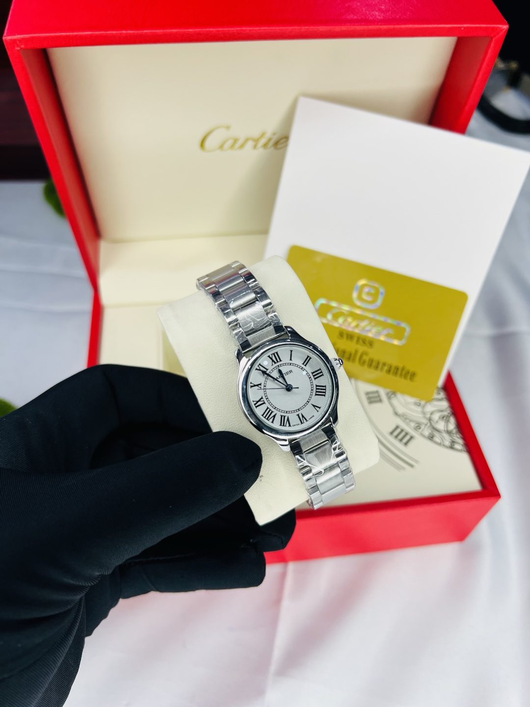 Silver tank Cartier female watch with branded box and bag - Image 3
