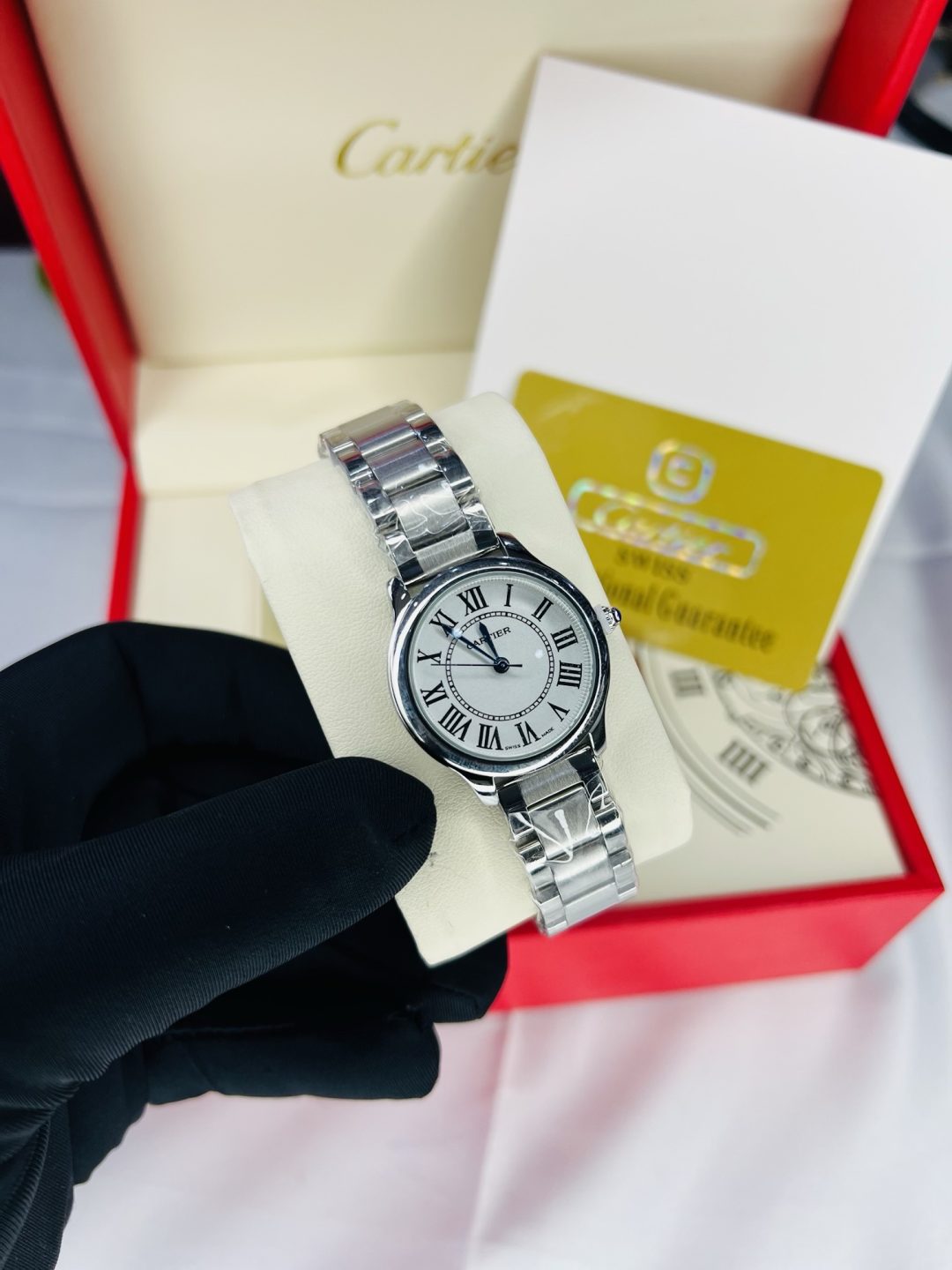 Silver tank Cartier female watch with branded box and bag - Image 2