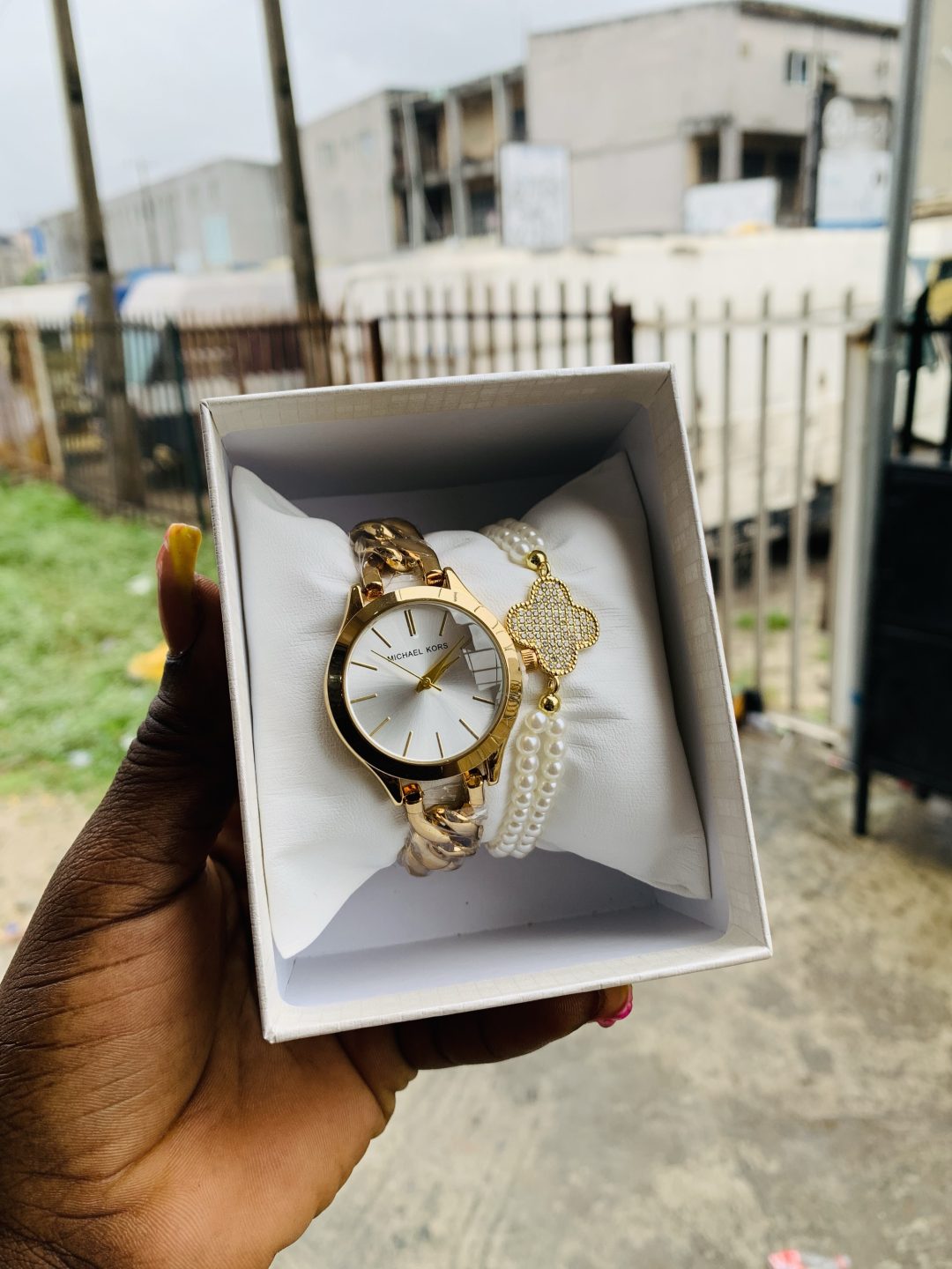 Micheal Kors gold combo with plastic box