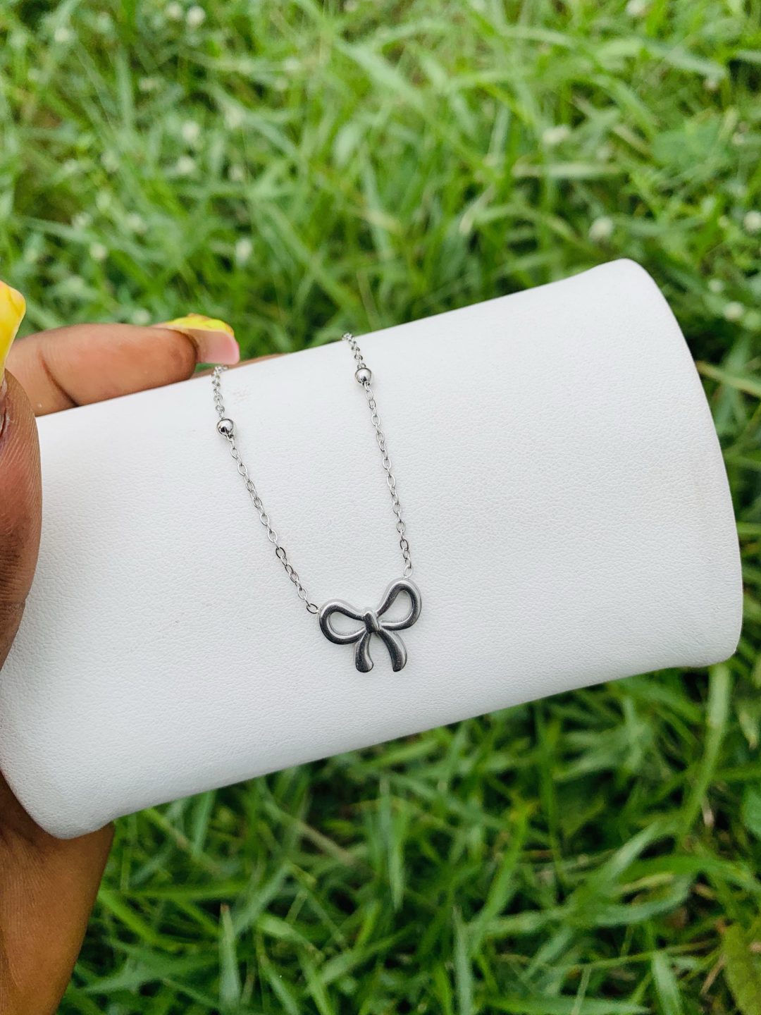 Bow tie silver necklace