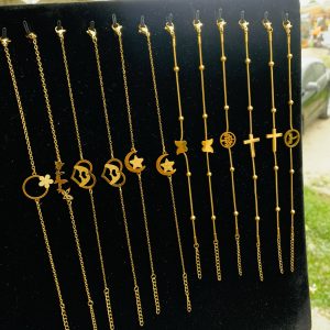 A dozen of mixed gold steel bracelet