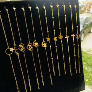 A dozen of mixed gold steel bracelet
