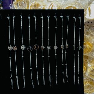 A dozen of mixed steel silver bracelets
