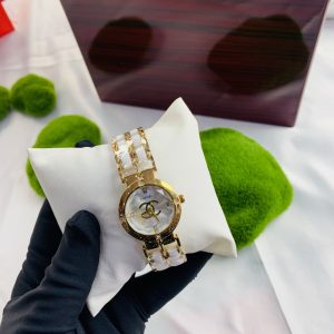 Channel gold white face female watch