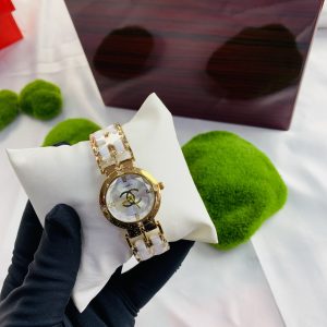 Channel gold white face female watch