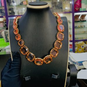 Trendy tassels gold /pink stone