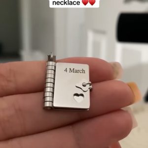 Engraved silver booklet necklace