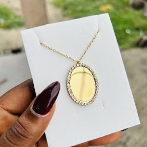 Engraved gold oval stoned necklace