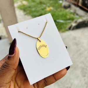 Engraved gold oval necklace