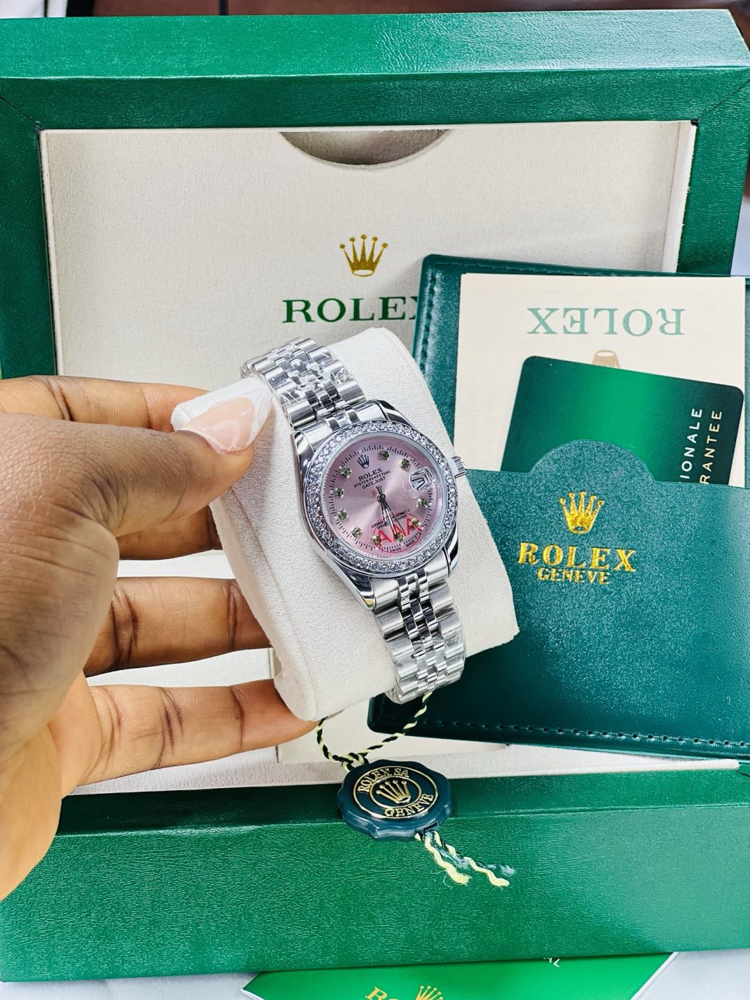 Silver Rolex watch/ green stones with exact box and bag! - Image 2