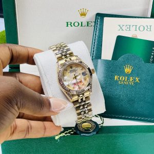 Rolex Gold stoned gold face watch with exact box and bag!