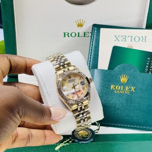 Rolex Gold stoned gold face watch with exact box and bag!
