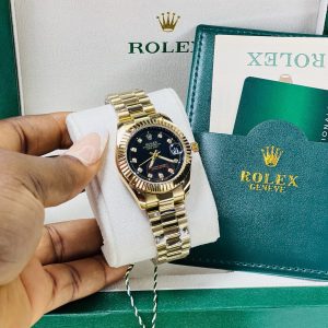 Rolex Gold black face  watch with exact box and bag!