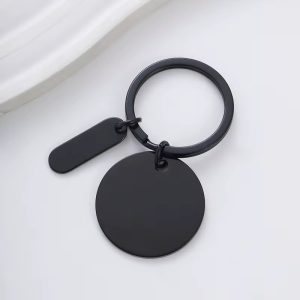 Engraved black circular key holder