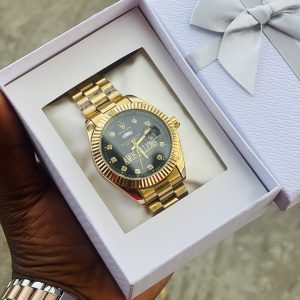 Engraved Gold black face Rolex watch