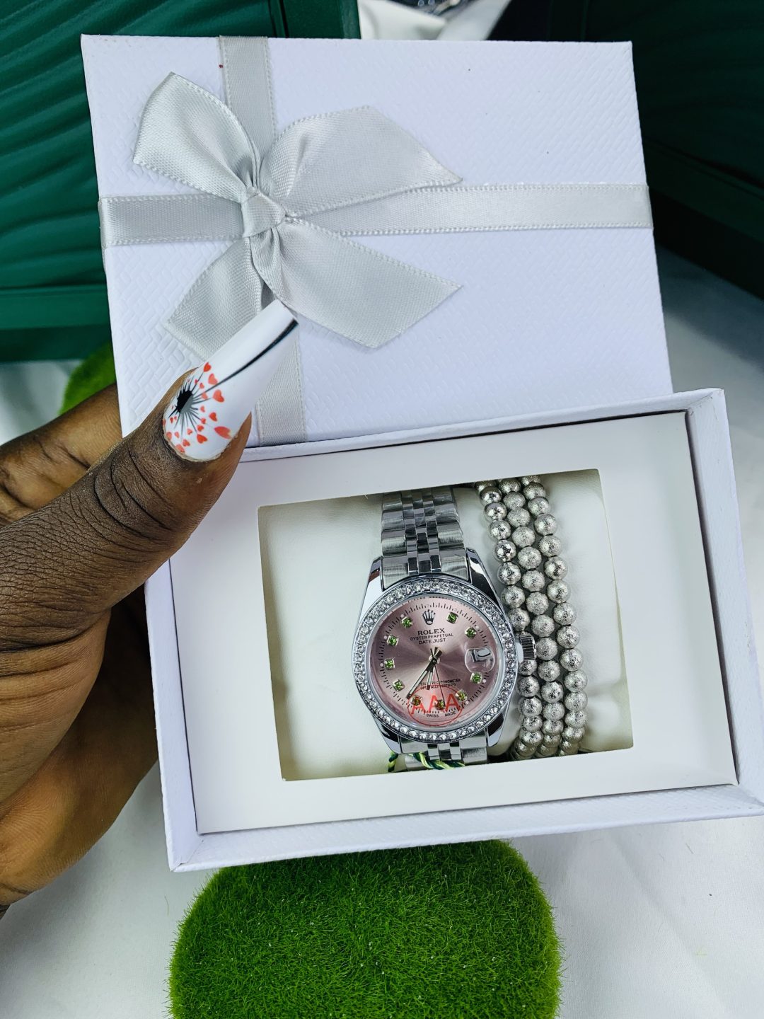Rolex silver pink stoned face with exact box