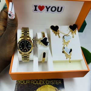 Rolex oyster gold black face comes with big paper box
